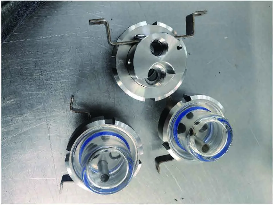 Clamping heads, flanges and seals